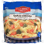 Gourmet Dining  garlic chicken; rotini pasta w/ brocooli & carrot28-oz